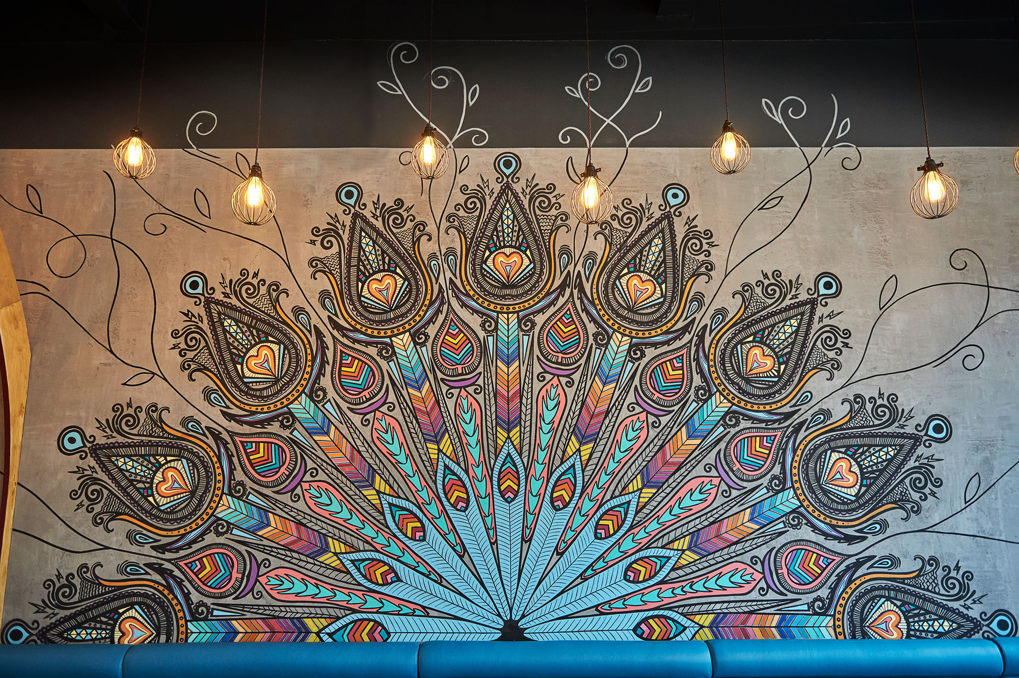 A mural in the style of peacock feathers