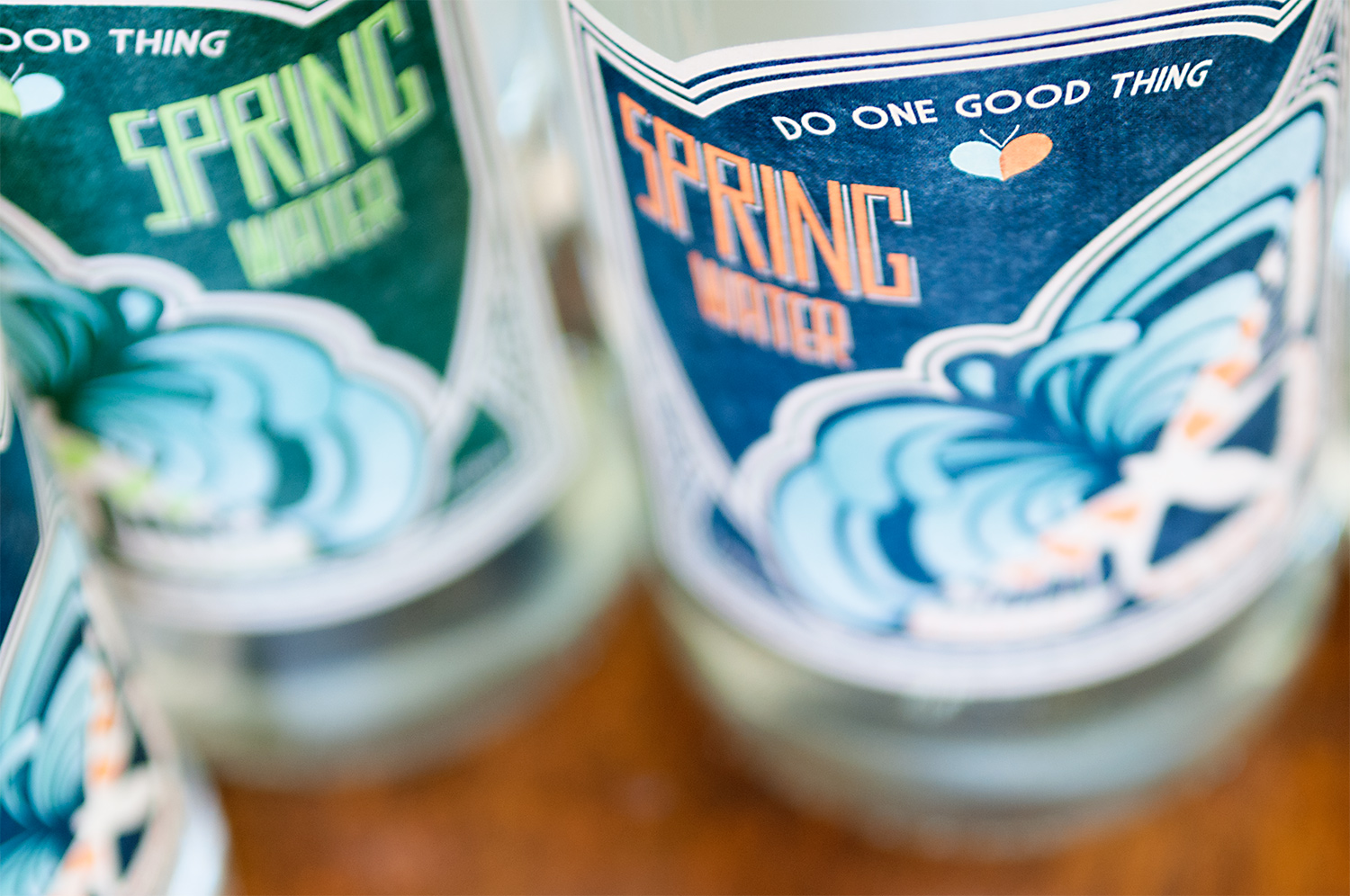 A close-up of the art deco inspired label design for One Water, designed by SAINT Design.